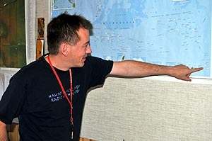 Mika pointing to Micronesia