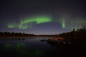 Northern lights reflecting from a lake